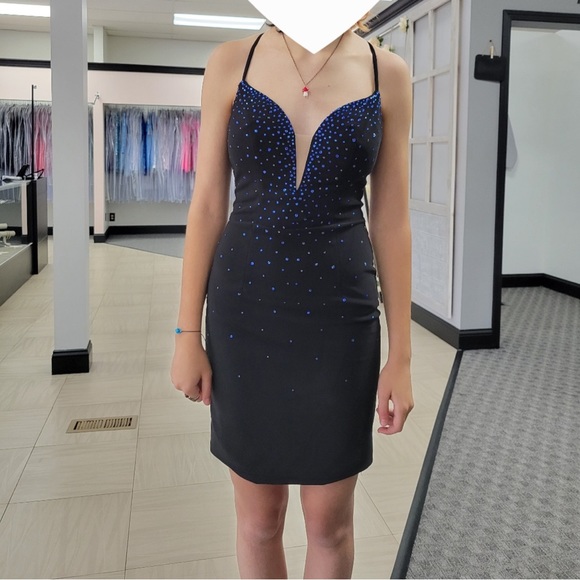 im selling this dress. it is black and fitted with blue rhinestones. - Picture 3 of 3